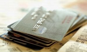 Stack of Credit Cards and Receipts --- Image by © Imagemore Co., Ltd./Corbis